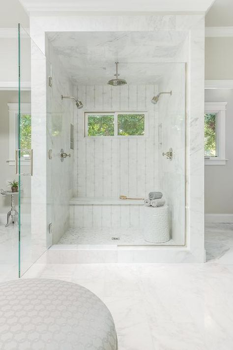 Fabulous master bathroom features a marble shower, placed in the center of the room, lined with his and hers shower heads facing each other as well as a marble shower bench under windows. Shower For Two, Master Bath Shower, Bathroom Shower Design, Master Shower, Bad Inspiration, Transitional Bathroom, Master Bath Remodel, Bathroom Redo, Minimalist Bathroom