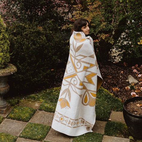 The colors of a warm, sunny day ️☀️ Our Family Floral Wool Blanket by Kira Murillo (Shoshone-Bannock) brings a welcoming warm feeling with its earthy yellow and tan color palette️. A beautiful testament to the continued growth of our families, communities, and knowledge, you can shop Kira's beautiful blanket at the link in bio. 💛 Tan Color Palette, Earthy Yellow, Textile Manufacturing, Luxury Blanket, Gold Labels, Beautiful Blankets, Native Art, Blanket Designs, Machine Knitting