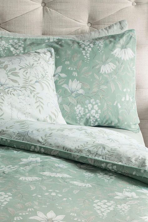 Parterre is a beautiful and sophisticated Laura Ashley floral design featuring printed white flowers, swirling patterns of leaves and finished with a flat piped edge. This design brings a modern feel to a vintage-style pattern, and these pillowcases are pure cotton sateen with a thread count of 200 for breathable comfort every night. These pillowcases are reversible so that you can style it two ways. Machine washable. 100% Cotton. 100 Cotton Duvet Covers, Dining Room Arm Chairs, Home Curtains, Sofa Shop, Cotton Pillow Cases, Cotton Duvet Cover, Cotton Duvet, Laura Ashley, Clothes Gift