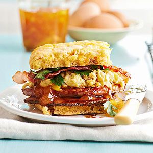 Can't choose between biscuits and gravy and an egg sandwich? Combine both in one savory, scrumptious package with this sweet potato biscuits, scrambled eggs, bacon, ham, and red eye gravy. Biscuit Sandwiches, Red Eye Gravy, Potato Biscuits, Best Breakfast Sandwich, Breakfast Sandwich Recipes, Sweet Potato Biscuits, Leftover Ham Recipes, Biscuit Sandwich, Ham Recipes