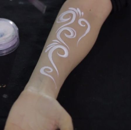 Art of Face Painting - How To Do Swirls and Curls Tutorial by Shelley Wapniak Mermaid Face Paint, Curls Tutorial, Face Painting Tips, Glitter Tattoo Stencils, Homemade Face Paints, White Face Paint, Face Painting Tutorials, Arm Painting, Airbrush Tattoo