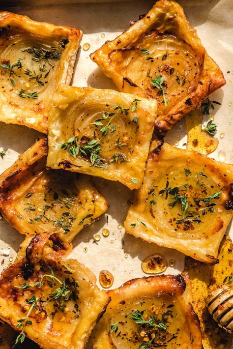 Upside-Down Tarts are taking the internet by storm, and for good reason. Just place your favorite fillings on a baking sheet, top with puff pastry, and bake 'til golden, and you've got the perfect party treats. Upside Down Tart Puff Pastry Savory, Puffy Pastry Appetizers, Puff Pastry Apps, Appetizers With Puff Pastry, Puff Pastry App, Cheese And Puff Pastry, Upside Down Puff Pastry, Puff Pastry Recipes Appetizers, Puff Pastry Appetizer