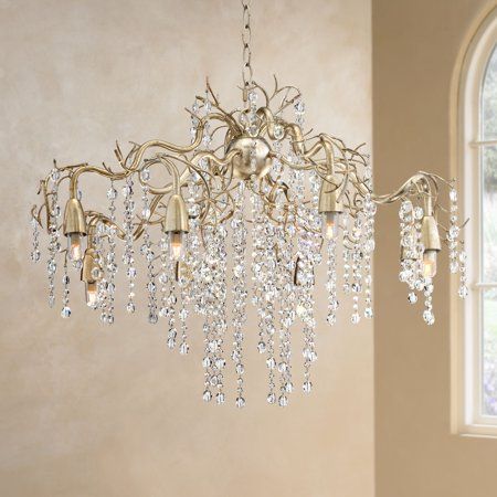 Shimmering strands of crystal beads rain down from the branches frame of this silver champagne chandelier. Eight lights shine down from the tips of the branches that attach in the center to a champagne silver sphere, hung from the ceiling by a decorative chain. A breathtaking fixture that will add a new level of luxury to your home decor. Size: 22 x 31 x 31. Champagne Chandelier, Foyer Chandeliers, Affordable Lighting, Large Foyer, Branch Chandelier, Dining Chandelier, Classy Bedroom, House Lighting, Silver Chandelier