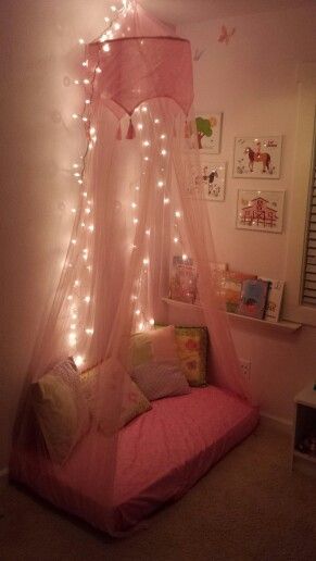 Reading corner, repurposed crib mattress, small spaces playroom Cute Small Playroom Ideas, Toddler Mattress Reading Nook, Livi G Room Ideas Decor, Crib Mattress Reading Nook, Girls Reading Corner, Reading Corner Bedroom Small Spaces, Canopy Reading Corner, Daughter Room Makeover, Crib Mattress Repurpose