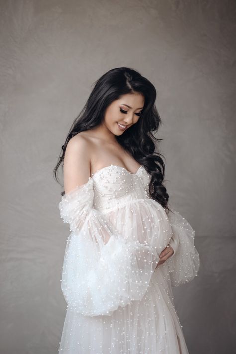 White Pearl Maternity Dress, Fluffy Maternity Dresses For Photoshoot, Maternity Elegant Photoshoot, Maternity White Dress Photo Shoot, Maternity Pictures Big Dress, Pregnancy Photos Dress, Model Maternity Shoot, Pearl Dress Maternity Shoot, Pearl Maternity Dress