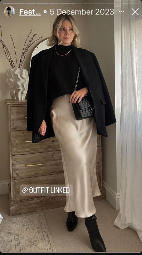 Silk Skirt Oversized Sweater, Satin Skirt Knee High Boots, Christmas Party Outfits Satin Skirt, Satin Skirt Thanksgiving Outfit, Date Night Outfit Ideas Fall, Silk Skirt And Boots, Beige Slip Skirt Outfit, Beige Satin Skirt Outfit Winter, Champagne Skirt Outfit Winter