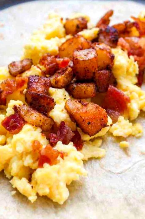 Start your day with a taste of Texas by indulging in these Lone Star Morning Tacos. Packed with crispy bacon, fluffy scrambled eggs, and perfectly seasoned potatoes, these tacos are a hearty and delicious way to fuel your morning. Whether you're hosting a brunch or just craving something savory, these tacos bring a bit of Southern comfort to your breakfast table. Easy to make and even easier to enjoy, they're sure to become a favorite in your morning routine. Potato Egg And Cheese Tacos, Breakfast Tacos Potato And Egg, Bacon And Egg Breakfast Tacos, Breakfast Potato Tacos, Potato And Egg Breakfast Taco, Bacon Breakfast Tacos, Potato And Egg Tacos, Potato With Egg Recipes, Texas Breakfast Tacos