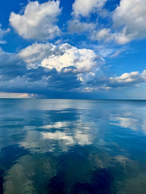 Image of numerous puffy clouds reflecting over a large body of water. Cloudscape Photography, Lake Photography, Cloud Photos, Clouds Photography, White Clouds, Water Waves, Sky And Clouds, Creative Jewelry, Lake Michigan