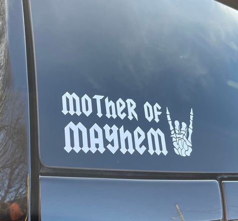 Car Decal Mother of Mayhem, Alternative, Vinyl Decal, Mama, Chaos Coordinator, Mom Life, Funny Car Decal, Skeleton Hands, Window Decal, Kids Listing is for 1 Mother of Mayhem decal. Please be sure to check the size and color before checking out. This is a physical product that will be shipped to you. Please message me if you need custom accommodations. Funny Mom Car Decals, Mom Car Stickers, Back Window Car Decal Ideas, Mom Car Decals, Car Decals Unique, Car Decal Ideas, Girly Car Decals, Truck Interior Accessories, Adhesive Vinyl Projects