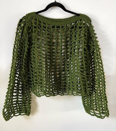 Freckle Love on Instagram: "Webby sweater in greeen!! Love this sweater style 😍 • • • • • #crochet #crocheted #crochetersofinstagram #crochetlove #crochetaddict #crocheted #crochetgram #crochetinspiration #crochettop #crochetsweater #smallbusiness #smallbusinessowner #fleamarket #crochetsweater #sleeves #crochetsleeves #shrug #crochetgirlgang #bolero #crochetshrug #knitshrug #handmadeshrug #shrug #crochetbolero #meshsweater #netsweater" Crochet Holey Sweater, Sweater Shrug Crochet, Crochet Net Sweater, Crochet Sweater Green, Mesh Sweater Crochet, Green Casual Crochet Sweater, Green Crochet Jumper, Crochet Shrug Outfit, Green Crochet Sweater