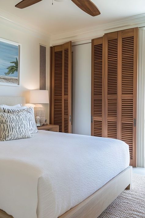 Keep your bedroom feeling light and airy with louvered closet doors. Perfect for adding texture and a tropical vibe to your space. 🌴✨ #LouveredDoors #TropicalVibes #BedroomStyle #ElevatedCloset Beachy Closet Doors, Tropical Closet, Beachy Closet, Louvered Door Ideas, Louvered Closet Doors, Louvered Door, Closet Designs, Closet Doors, Closet Design