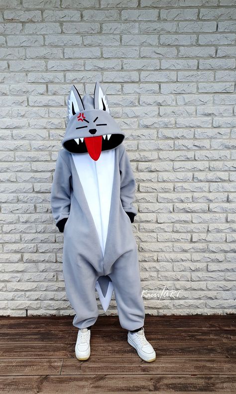 Meet my handcrafted unisex Grey Wolf inspired kigurumi for casual cosplay, geeky parties, new adventures or just everyday life. I call it 'The Annoyed Wolf'! Why? Because this Wolf has a lovely anger symbol on it with annoyed face too, also he isn't afraid to show his tongue to everyone! Don't be afraid and you! Intentionally... or not! The tongue part can be easily put over on the top or inside the hoodie whenever you like it. Also, your Wolf kigu can be done in any color you want. So, be original feel unstoppable and just have fun! Material: Fleece (100% polyester) Type: onesie/kigurumi/costume Genger: Unisex Style: Full Color Annoyed Wolf Size: YOURS (custom made to order, I will have to ask some of your measures) ABOUT This Handmade cozy kigurumi is made of quite thick high quality pol Anger Symbol, Wolf Onesie, Plus Size Overall, Annoyed Face, Wolf Size, Wolf Boy, Wolf Hoodie, Layered Hoodie, Casual Cosplay