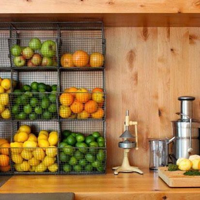 Dedicating a small wall to vertical storage can be a simple way to keep fresh fruits, potatoes & onions off the counter and attractively contained. #CountrySquare #Kitchen #Ideas #DIY #Organize #Cook #Cooking #Recipes #Storage #Design #InteriorDesign #Produce Organiser Cucina, Hanging Fruit Baskets, Kabinet Dapur, Kitchen Craft, Diy Kitchen Storage, Fruit Storage, Trendy Kitchen, Kitchen Pantry, Craft Storage