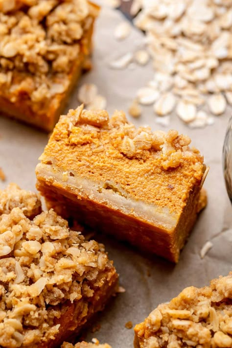 These pumpkin pie bars feature a buttery shortbread crust, a creamy pumpkin filling, and a brown sugar oat crumble topping. Packed with all the cozy fall flavors you love, they’re simpler to make than a classic pumpkin pie! Pumpkin Crumb Bars, Pumpkin Pie With Crumble Topping, Pumpkin Bars With Shortbread Crust, Pumpkin Bars With Graham Cracker Crust, Pumpkin Shortbread Bars, Pumpkin Pie Bars With Shortbread Crust, Pumpkin Streusel Bars, Pumpkin Smores Bars, Pumpkin Pie Desserts