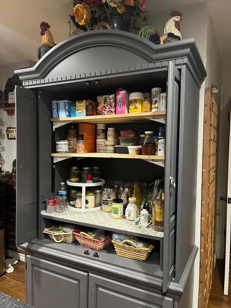 An old television armoire we turned into a useful extra storage kitchen cabinet. Thanks Babe for putting the extra shelving in. Convert Armoire To Pantry, Armoire In Kitchen, Tv Armoire Coffee Bar, Armoire Ideas, Tv Armoire Repurposed, Armoire Coffee Bar, Tv Hutch, Kitchen Armoire, Extra Kitchen Storage