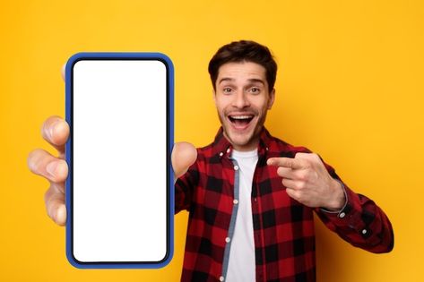 Excited guy pointing at black empty smar... | Premium Photo #Freepik #photo #showing-phone #phone #smartphone #mobile-mockup Excited Character, Phone Graphic Design, Mobile Frame Png, Thumbnail Poses, Thumbnail Material, Mobile Png, Instagram Glowing Logo, Science Exhibition Ideas, Diy Crafts Phone Cases