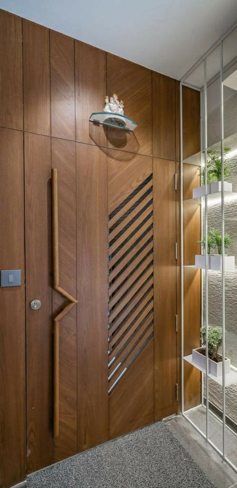 Groove Pattern On Door, Main Door Design Entrance, Grill Doors, Jalli Design, Groove Pattern, Main Doors, Wooden Panelling, Door Design Photos, Main Entrance Door Design