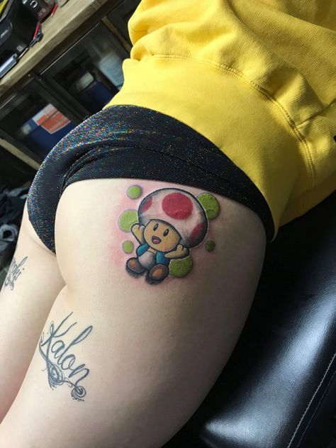 Toad tattoo from Mario Mario Power Up Tattoo, Mario Toad Tattoo, Toad Tattoo Mario, Mario Kart Tattoo, Video Game Tattoo Ideas, Mario Tattoos, Game Tattoo Ideas, Tattoo Wade, Toad Tattoo