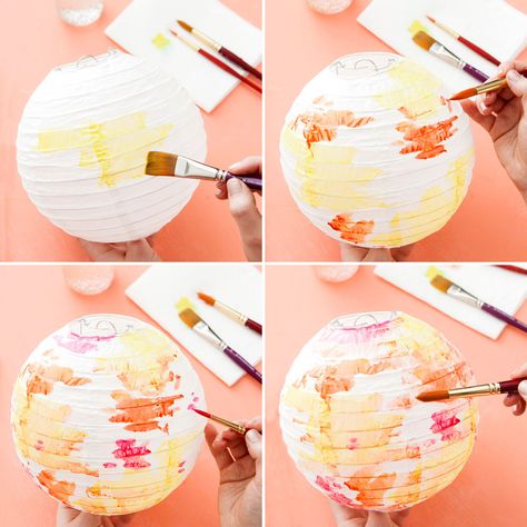 Follow this easy DIY tutorial to upgrade paper lanterns with watercolor paints for your spring party. Painted Lanterns Diy, Chinese Lanterns Painting, Painting Paper Lanterns, Painted Paper Lanterns, Diy Chinese Lanterns, Ikea Paper Lantern, Ikea Lanterns, Party Lanterns, Diy Paper Lanterns