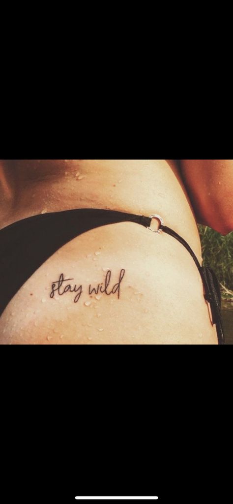 Stay Wild Buttcheek Tattoo, Western Tattoo Sayings, Stay Wild Tattoos For Women, Stay Wild Tattoo Buttcheek, Western Tattoo Quotes, Small Punchy Tattoos, Western Rib Tattoos For Women, Small Southern Tattoos, Barrel Racing Tattoos