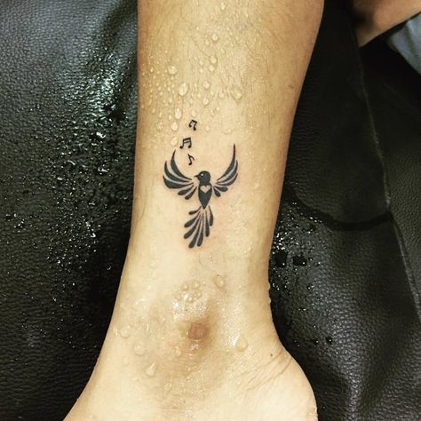 Bird Singing With Music Notes Tattoo Idea On Ankle Bird Wrist Tattoo, Music Bird Tattoos, Songbird Tattoo, Music Bird, Bird Tattoo Meaning, Vogel Tattoo, Music Notes Tattoo, Bird Tattoo Wrist, Quotes Heart