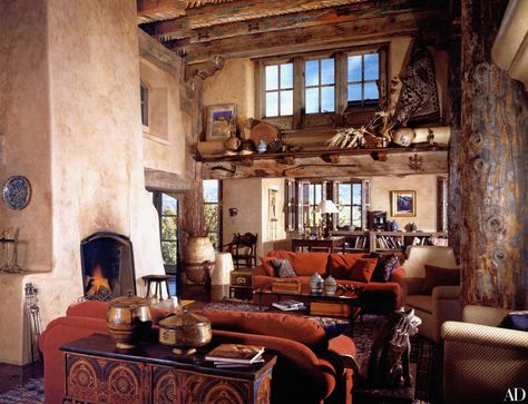 Gene Hackman’s Rustic Santa Fe Home Photos | Architectural Digest Southwest Inspired Living Room, Hacienda Living Room, Santa Fe Interior Design, Santa Fe Style Decor, Texas Hill Country Homes, Santa Fe Interiors, Southwestern Homes, Santa Fe Decor, Santa Fe Style Homes