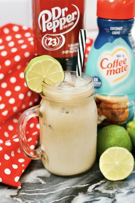 "A dirty Dr Pepper is an easy drink to make, and it's perfect for summer.  It's refreshing and takes the Dr Pepper soda to a new level by adding cream and coconut flavor.  This is an easy recipe with just two ingredients, so it's simple to make at home.  You can also use cream and coconut syrup if you prefer.  This is a fun summer drink for kids or for adults, and you even make it for a crowd by doubling or tripling the recipe." Nanaimo Bar Recipe, Coke Recipes, Panera Recipes, Cracker Barrel Recipes, Easy Drinks To Make, Starbucks Holiday Drinks, Fun Summer Drinks, Coconut Syrup, Seafood Entrees