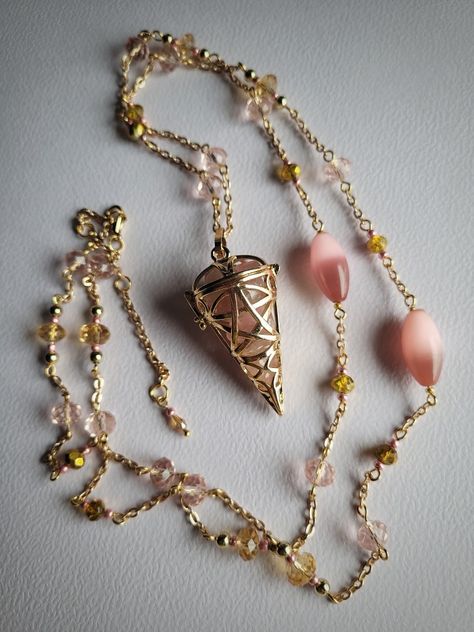 Openable pendulum necklace with strawberry quartz inside. 🩷  #diy #handmade #witchy #witch #fairy #necklace #goddess #pendulum #jewellery #jewelry #crystals #noita #keiju #kaulakoru #heiluri #teeseitse #askartelu Pendulum Aesthetic, Pendulum Diy, Witch Pendulum, Crystal Necklace Diy, Spiritual Necklaces, Witch Fairy, Pendulum Necklace, Spiritual Necklace, Handmade Crystal Jewelry