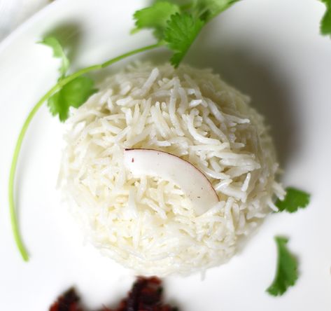 Coconut rice is a simple and flavorful vegan and gluten-free side that compliments many asian entrées. I cook the rice in unsweetened coconut milk. To make Instant Pot Coconut Rice, I add all the ingredients to the pot and pressure cook for 6 minutes at high pressure. That's how simple this recipe is! Instant Pot Coconut Rice, Coconut Rice Recipe, Coconut Lime Chicken, Minute Rice, Gluten Free Sides, Stove Top Recipes, 3 Ingredient Recipes, Unsweetened Coconut Milk, Coconut Rice