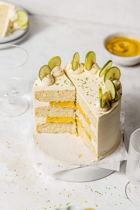 Spring is in the air, and with it comes bright & zesty flavors, like the ones in this key lime cake! The moist white cake layers are filled with a sweet & tart key lime curd and enrobed in a silky swiss meringue buttercream. Each bite is a citrus lover's dream! Key Lime Wedding Cake, Key Lime Layer Cake, Key Lime Curd, Lime Cake Recipe, Moist White Cake, Key Lime Cake, Orange Pound Cake, Lime Curd, Lime Cake