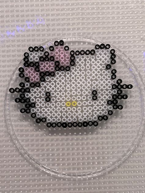 Hello Kitty Pearl Beads, Hello Kitty Melty Beads, Hello Kitty Bead Pattern, Coquette Perler Beads, Perler Bead Hello Kitty, Iron Beads Pattern, Iron Beads Ideas, Kitty Perler Beads, Hello Kitty Perler Beads