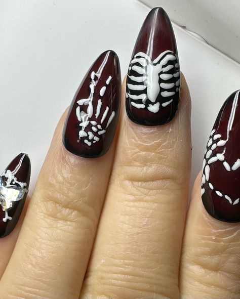 Bones 🦴 nails 💅🏼 I’m creating some Halloween nails by joining a challenge this month. So much fun. Starting with the theme bones. Go to www.thenailsatelier.com and get yourself a customized set. Don’t forget to start with a sizing card as sizing is imported to the perfect fit of the nails and gives your press ons the most natural look on your nails and keep them stay on your nails and not pop off.

DM me for any questions! Happy to help you.

🤍 Jennifer Bones Nails, Bones Nails Acrylic, Bone Nails, Halloween Nails Bones, Skeleton Hand Charm Nails, Skull And Crossbones Nail Art, Claret Red, Make Design, Halloween Nails