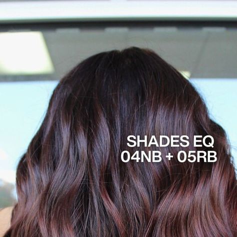 Redken on Instagram: "Looking for a classic with some kick? We suggest Cherry Cola 🍒🥤  @beardedbeautyhair makes use of their client’s grown out balayage to add rich, red-violet tones to h their base.   A concern many stylists have taking their previously lightened clients darker: the hair lacking depth and lustre. This formula creates ribbons of dimension with that iconic #ShadesEQ shine ✨ Swipe to see the before.  The #RedkenRecipe: 🩷 Zone 1: Shades EQ 04NB (2/3) + 05RB (1/3) 🩷 Zones 2 + 3: Shades EQ 05RV + 05RB (equal parts)  #CherryCola #CherryColaHair" Grown Out Balayage, Shades Formulas, Redken Formulas, Cola Hair, Redken Color Gels, Cherry Cola Hair, Women's Haircuts, Violet Brown, Work Hair