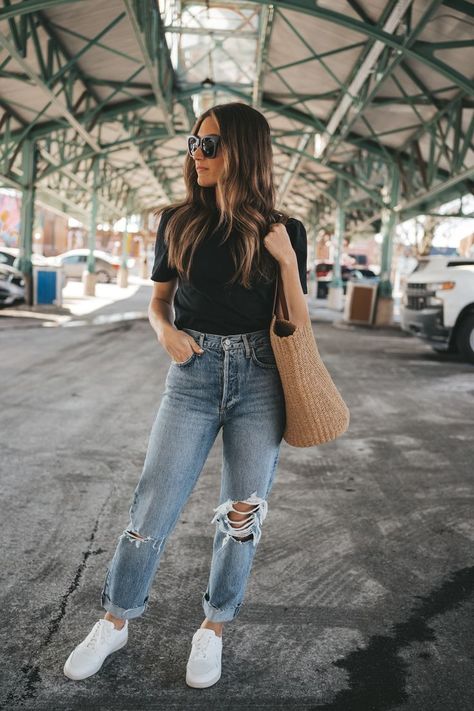 ashley wearing a black puff sleeve tee, distress denim, white sneakers, and a straw tote bag standing in an outdoor market 2023 Outfits Spring, Women’s Casual Spring Outfits, City Day Outfit Spring, Spring Casual Outfits Women 2023, Casual Outfit 2023 Winter, Spring Outfits 2023 Dress, Women’s Casual Outfits 2023, Mom Park Outfit Casual, Spring Outerwear 2023