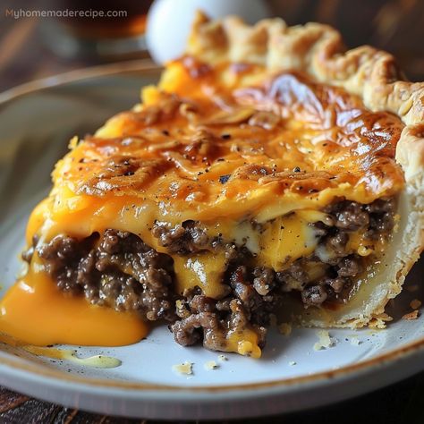 Enjoy a comforting slice of Pioneer Woman Cheeseburger Pie, made with ground beef, cheddar cheese, and a simple Bisquick batter. Sausage Pie Recipe, Sausage Pie, Cheeseburger Pie, Pizza Burgers, Burger Toppings, Breakfast For Dinner, Breakfast Dessert, Pioneer Woman, 1 Pound