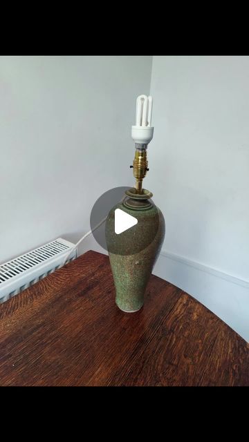 Tim Thornton on Instagram: "Turning a vase into a lamp
This elegant porcelain vase was made by Bridget Drakeford, who lives just on the other side of the River Wye from me.
I thought I'd turn it into a table lamp, but I wanted to be able to turn it back into a vase if I wanted to, which meant not drilling any holes or making any other permanent modifications.
So the answer is to use a bung fitting, which expands to fit the top of the vase, and have the cable enter the lamp just below the bulb holder.
I also decided to use a bayonet bulb, as that allows the switch to be incorporated into the bulb holder, which cannot be done with European Edison bulb holders operating at 230V.

Look carefully at the bulb holder, and tell me what the 3rd prong is for!

All it needs now is a decent bulb (inst Electric Lamp, The Switch, Edison Bulb, Porcelain Vase, The Other Side, The River, Tell Me, A Table, Turning