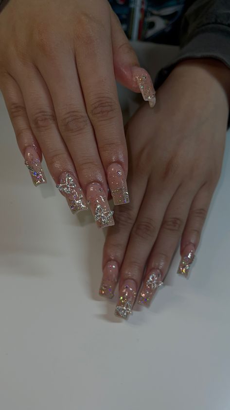 Glitter Nails With Charms, Nails Inspiration With Charms, Gold Nails With Pearls, Ombre Nails With Charms, Birthday Nails With Charms, Birthday Nails Charms, Glitter Butterfly Nails, Silver Nails With Butterflies, Silver Butterfly Nails