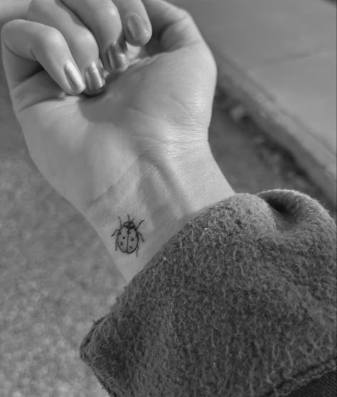 Ladybug Friendship Tattoo, Ladybug Tattoo Matching, Ladybug Tattoo On Wrist, Ladybug Wrist Tattoo, Cartoon Ladybug Tattoo, Small Ladybug Tattoo Black And White, Lady Bug Tat, Daisy And Ladybug Tattoo, Ladybug Tattoo Fine Line