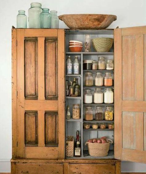 An antique larder cabinet that was refurbished into a pantry.   The re-imagined Larder cabinet is swooping in to save the day and change how we use our kitchens...  Read more on the Dura Supreme #Cabinetry #Blog! Stand Alone Kitchen Pantry, Desain Pantry Dapur, Farmhouse Pantry, Desain Pantry, Casa Country, Kitchen Pantry Cabinets, Kitchen Pantry Design, Pantry Ideas, Pantry Door