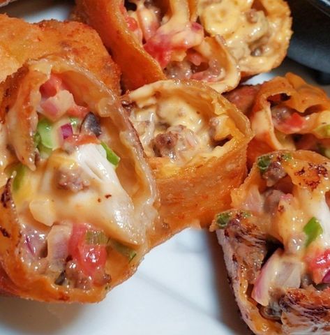 Nacho Egg Rolls – 99easyrecipes Egg Roll Ingredients, How To Make Nachos, Beef Wraps, Yellow Bell Pepper, Eggs In Peppers, Wrap Recipe, Nacho Cheese Sauce, Loaded Nachos, Egg Roll Wrappers