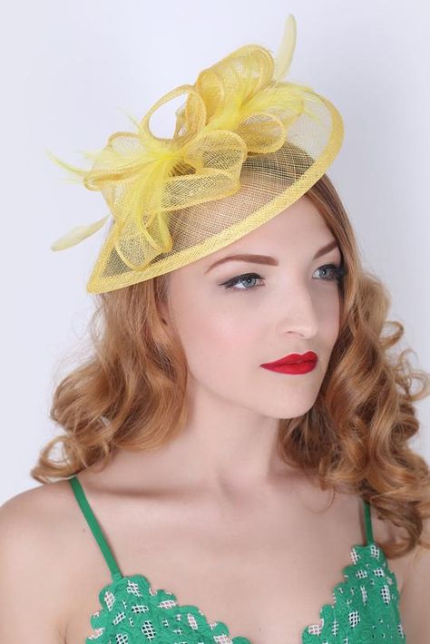 Browse our beautiful fascinator hats selection for a regal, elegant touch. High tea, bridal shower, wedding or derby, we got your head covered in elegance! Hair Styles With Hats, Yellow Fascinator, Timeless Glamour, Yellow Feathers, Hat Fascinator, Yellow Hat, Fancy Hats, Mesh Hat, Mesh Ribbon