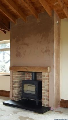 Wallpaper Chimney Breast, Brick Fireplace Log Burner, False Chimney Breast, Stove Hearth, Wood Burner Fireplace, Chimney Decor, Wood Burning Stoves Living Room, Log Burner Living Room, Log Burner Fireplace