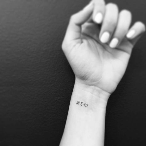 IIII.E. and heart tattooed on the wrist. E Initial Tattoo, Latin Script, Minimalist Lettering, Typewriter Letters, Font Letters, Initial Tattoo, E Tattoo, Little Tattoos, Handwritten Font