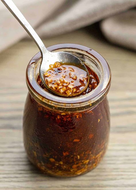 Crunchy Garlic Chili Oil is a condiment that can add a bit of heat and flavor to dishes from salads to pizzas to pasta noodles and more! Homemade Pasta Noodles, Garlic Chili Oil, Chili Oil Recipe, Cheddar Cheese Sauce, Crispy Shallots, Aioli Recipe, Flavored Oils, Chili Oil, Homemade Sauce