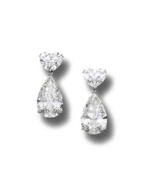 Impressive pair of diamond earrings.  Each composed of a heart-shaped diamond weighing 5.01 and 5.04 carats respectively, suspending a removable pear-shaped diamond drop weighing 12.02 and 12.92 carats respectively, mounted in white gold. Heart Shape Diamond Earrings, Bee Earring, Pear Diamond Earrings, Heart Shaped Diamond Earrings, Heart Diamond Earrings, Accessories Stand, White Gold Drop Earrings, Pear Earrings, Jewel Wedding