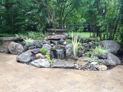 Pondless Waterfall Landscape Ideas Rochester NY Fairy Herb Garden, Ideas Para Decorar Jardines, Sitting Wall, Landscaping Water Feature, Waterfall Landscaping, Aqua Scape, Swimming Ponds, Diy Water Feature, Small Water Features