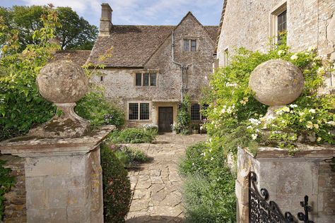 A 700-year-old manor house in the Cotswolds with its own moat, secret gardens and royal connections Cotswold Manor House, Dnd Pirate, Cotswold House, British Houses, Nice Thoughts, English Manor Houses, British Architecture, Old Manor, Medieval Houses