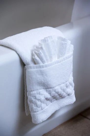 How To Decorate Towels In A Bathroom: 22 Unique Ways Towels In Baskets In Bathroom, Decorative Towels In Bathroom Display Ideas Guest Rooms, Decorative Towel Folding Hanging, Displaying Towels In Bathroom, Hand Towel Bathroom Ideas, Guest Bath Towel Display, How To Display Bathroom Towels, Towel Folding Ideas Bathroom, How To Fold Towels For Display Bathroom