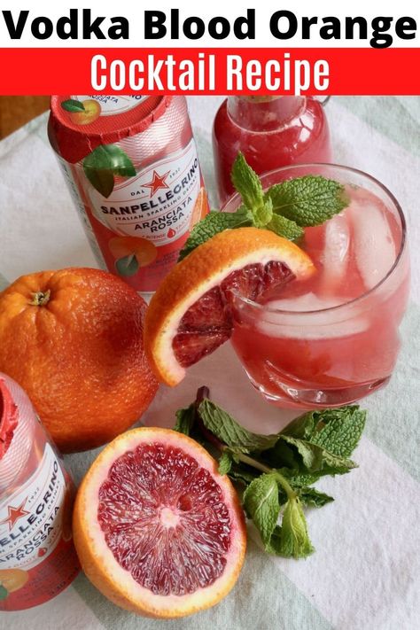 Learn how to make the best vodka blood orange cocktail recipe. You can make our easy blood orange cocktail with vodka or gin, or even add a splash of sparkling champagne to cheers a special celebration. Our easy recipe features vodka, fresh blood orange juice, soda, San Pellegrino Aranciata Rossa Italian soda and mint sprig. The citrus fruit is in season in the winter and spring so it's the perfect festive cocktail for the Christmas holidays and new years eve. Cocktail With Vodka, Blood Orange Vodka, Blood Orange Recipes, Blood Orange Cocktail, Orange Recipe, Best Vodka, Orange Cocktail, Orange Vodka, Sparkling Champagne