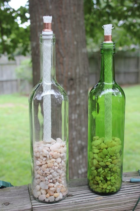 Magnolia & Main: DIY Wine Bottle TIki Torches Bottle Tiki Torch Diy, Wine Bottle Tiki Torch Diy, Tiki Torches Diy, Wine Bottle Pictures, Backyard Wedding Pool, Bottle Torch, Wine Bottle Tiki, Wine Bottle Tiki Torch, Diy Wine Bottle